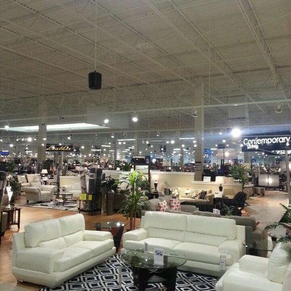 Photo taken at American Furniture Warehouse by Angela R. on 2/19/2014