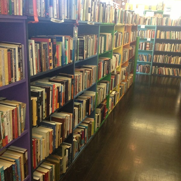 Photo taken at Open Books by Leslie B. on 9/14/2013