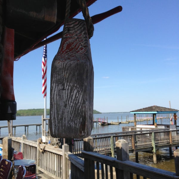 Photo taken at Tim&#39;s Rivershore Restaurant and Crabhouse by Andi F. on 4/26/2013