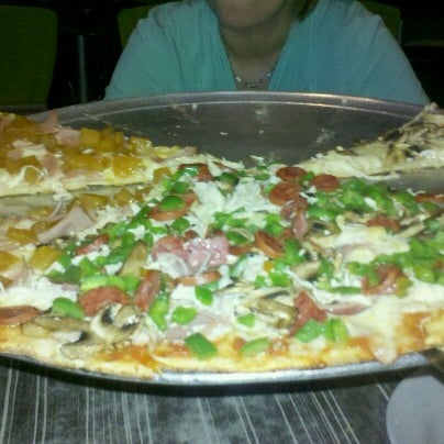 Photo taken at Salvator&#39;s Pizza by Chantal G. on 4/4/2013