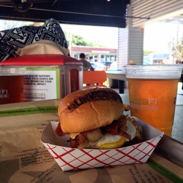 Photo taken at BurgerFi by Dave L. on 3/3/2014