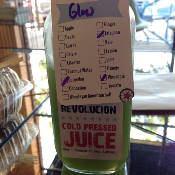 Photo taken at Revolucion Coffee + Juice by Jessica T. on 6/8/2014