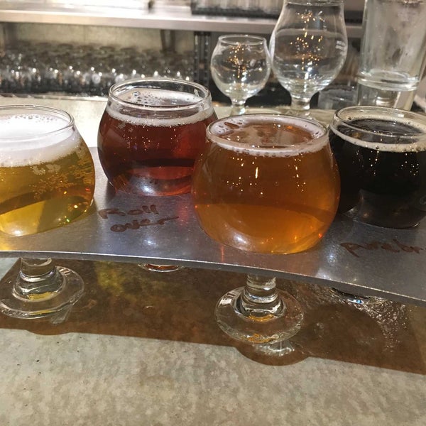 Photo taken at Happy Basset Brewing Company by Joshua C. on 1/8/2019