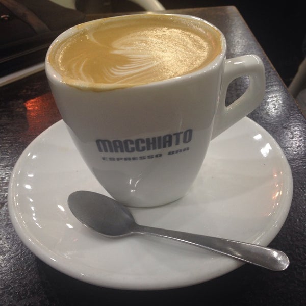 Photo taken at Macchiato Espresso Bar by Erik P. on 7/23/2014