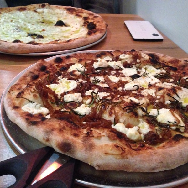 Photo taken at Pompieri Pizza by Sara W. on 2/2/2014