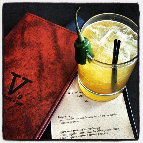 Photo taken at V&#39;s restaurant + bar by Greg B. on 9/4/2013