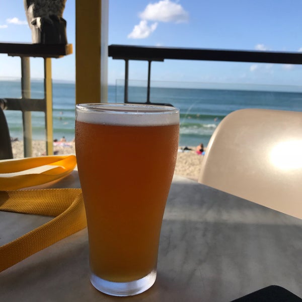 Photo taken at Noosa Heads Surf Club by Brock S. on 4/11/2018