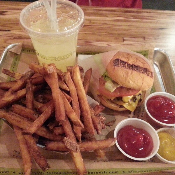 Photo taken at BurgerFi by June K. on 3/27/2014