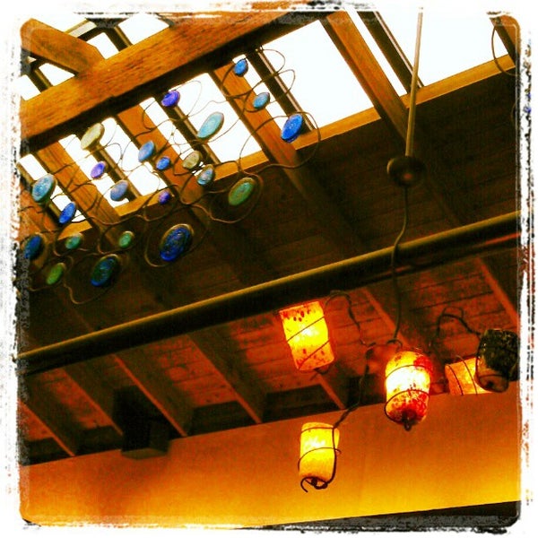 Photo taken at Fat Fish Cantina Grill by Alexander N. on 1/4/2013
