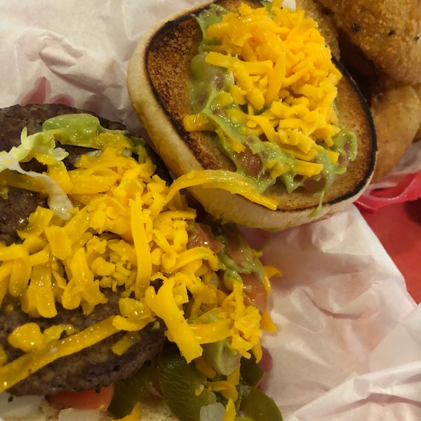 Photo taken at Hut&#39;s Hamburgers by A.D. on 6/19/2019