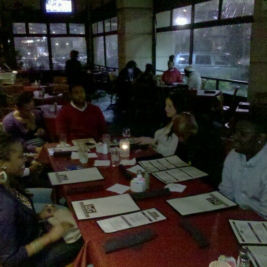 Photo taken at Lenox Square Grill by Curtis H. on 12/5/2012