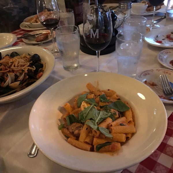 Photo taken at Maggiano&#39;s Little Italy by Jasper M. on 10/12/2019
