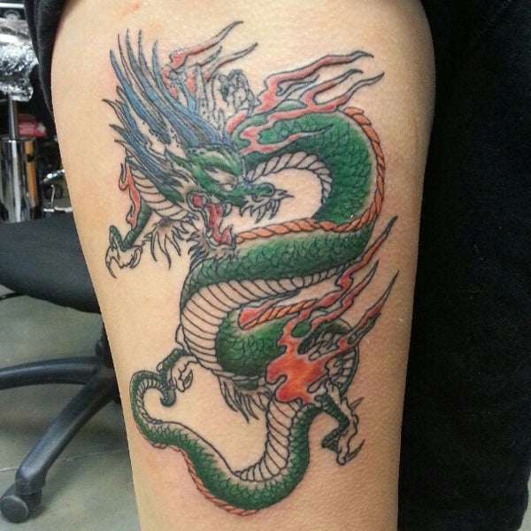 Photo taken at Wyld Chyld Tattoo by Christopher C. on 12/1/2012