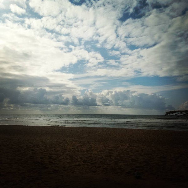 Photo taken at Praia de Buraquinho by Dejaldir S. on 8/9/2015
