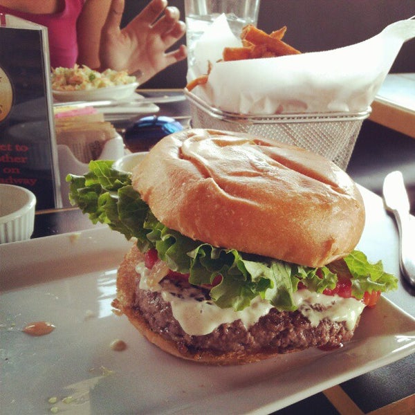 Photo taken at 5 Star Burgers by Guy M. on 9/23/2012