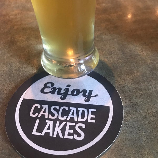 Photo taken at Cascade Lakes Brewing by Julie K. on 6/6/2018