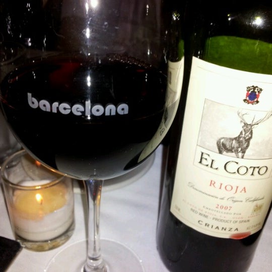 Photo taken at Barcelona Restaurant &amp; Wine Bar by Omar R. on 8/18/2012