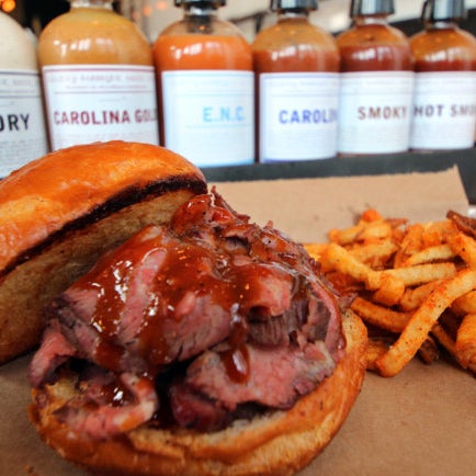 Smoked beef tri-tip on brioche kicked with BBQ rub-dusted fries.