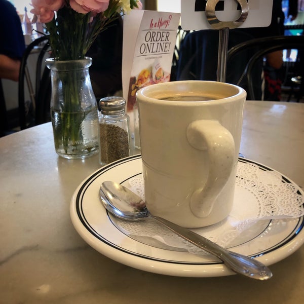 Photo taken at Toni Patisserie &amp; Café by Andrew P. on 4/25/2019