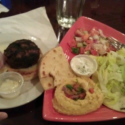 Photo taken at Isis Restaurant &amp; Bar by Khadija S. on 1/15/2013