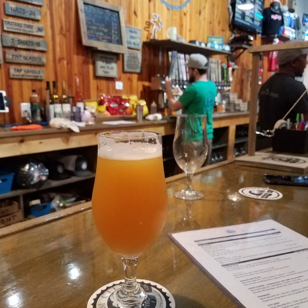 Photo taken at Palm City Brewing Company by Adam D. on 3/12/2020