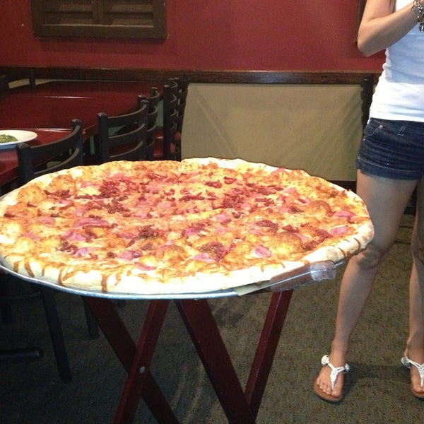Photo taken at Russo&#39;s New York Pizzeria by Skylar S. on 3/31/2013