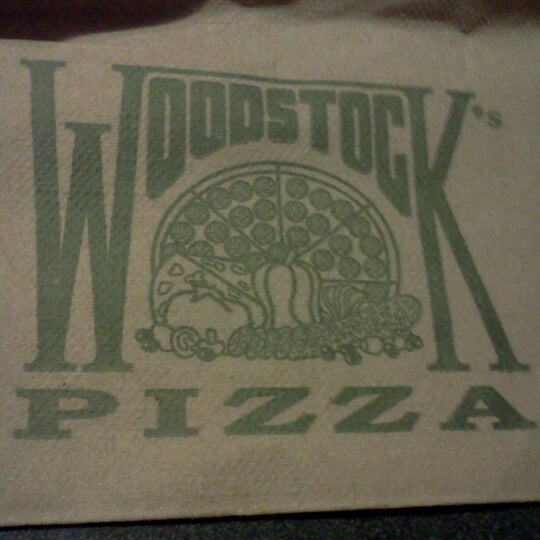 Photo taken at Woodstock&#39;s Pizza by Katie H. on 2/26/2013