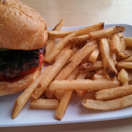 Photo taken at Crave Real Burgers by Brad T. on 3/16/2014