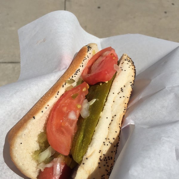 Photo taken at Kim &amp; Carlo&#39;s Chicago Style Hot Dogs by Mindy S. on 4/13/2015