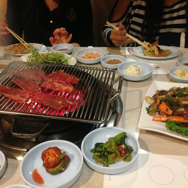 Photo taken at Woo Chon Korean BBQ Restaurant by Tomoko O. on 6/15/2013