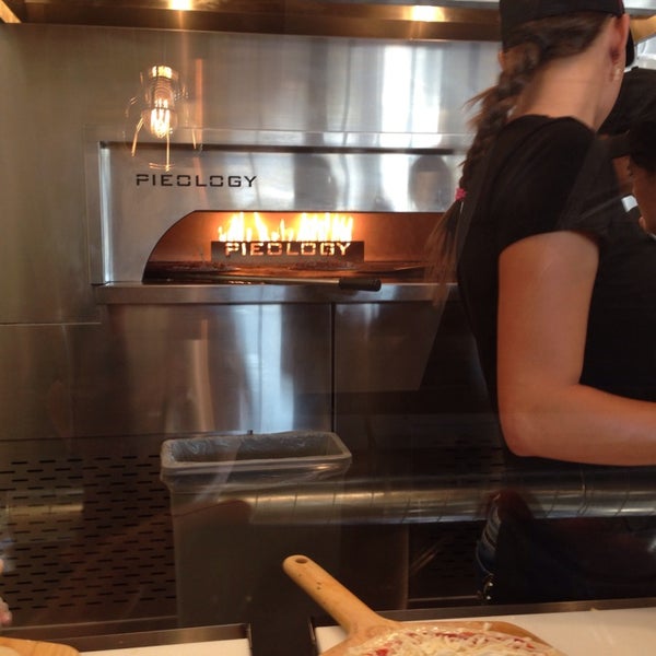 Photo taken at Pieology Pizzeria by Mike (Arch) A. on 10/9/2014