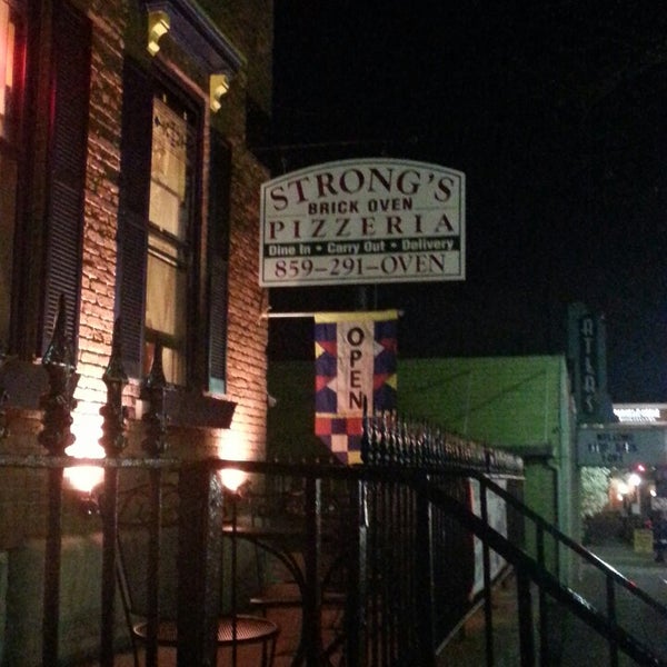 Photo taken at Strong&#39;s Brick Oven Pizzeria by Lynda P. on 4/13/2013