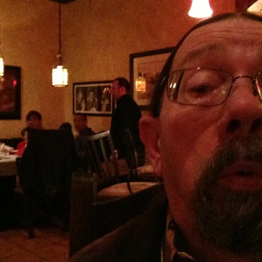 Photo taken at Mezzo Bistro and Wine by Wally S. on 11/16/2012