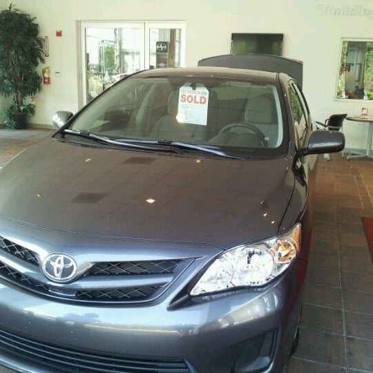 Photo taken at Wesley Chapel Toyota by Tina S. on 2/8/2013