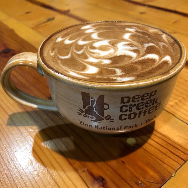 Photo taken at Deep Creek Coffee by Christopher Y. on 12/13/2017