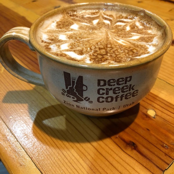 Photo taken at Deep Creek Coffee by Christopher Y. on 12/13/2017