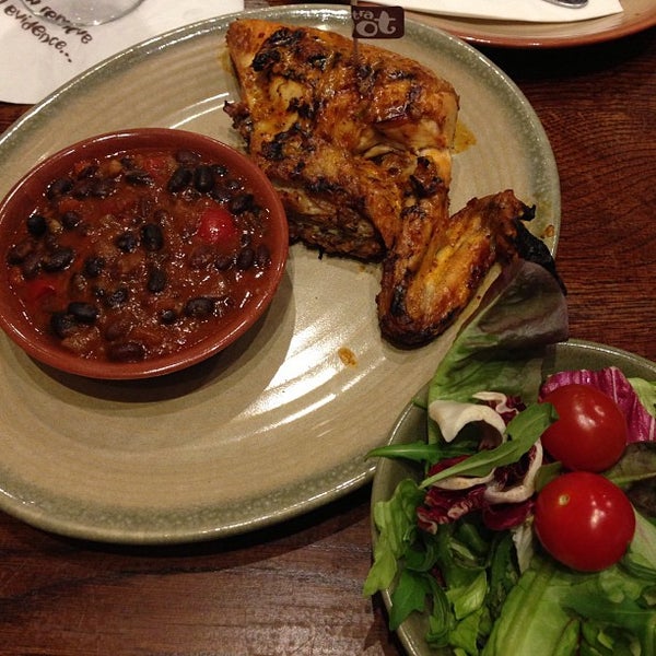 Photo taken at Nando&#39;s by Alexander on 4/9/2013
