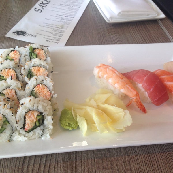 Photo taken at Squid Ink Sushi Bar by Janai W. on 4/7/2015
