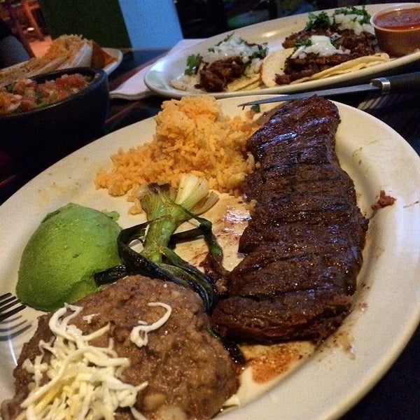 Photo taken at Tecalitlan Restaurant by Oscar L. on 8/12/2014