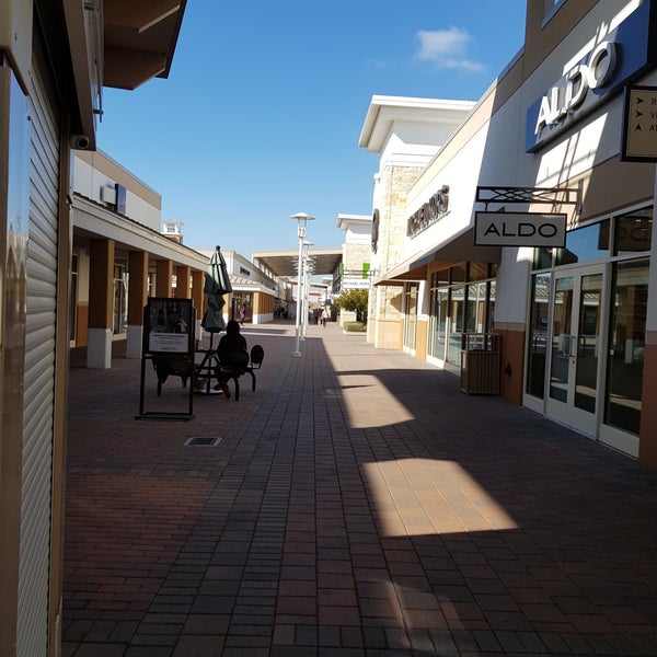 Photo taken at Grand Prairie Premium Outlets by Victoria G. on 2/4/2018