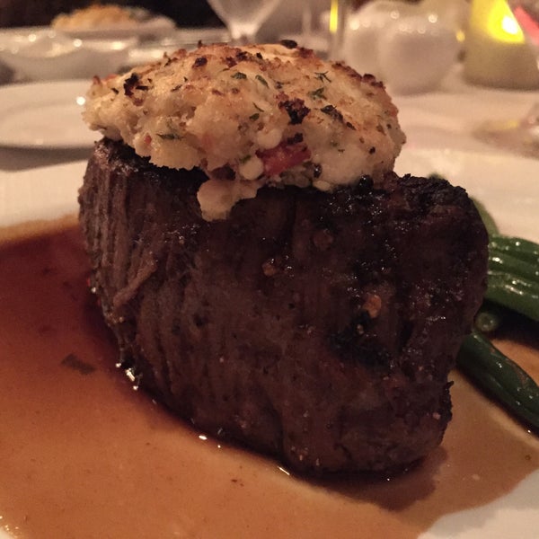 Photo taken at Russell&#39;s Steaks, Chops, &amp; More by Patrick H. on 4/8/2015