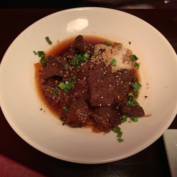 Photo taken at Mura Japanese Restaurant by Christian A. on 4/8/2019