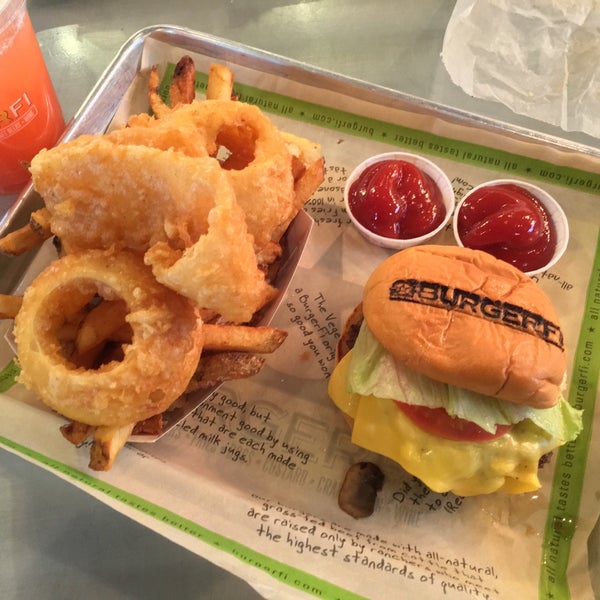 Photo taken at BurgerFi by Christian A. on 4/19/2016