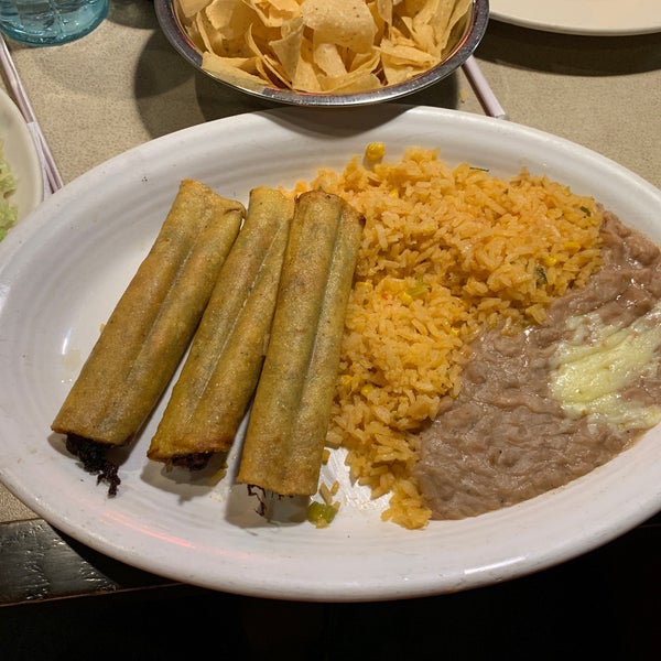 Photo taken at La Parrilla Mexican Restaurant by Christian A. on 1/10/2019