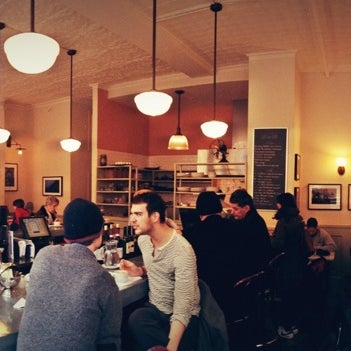 Photo taken at Cafe Minerva by Viv S. on 1/25/2013