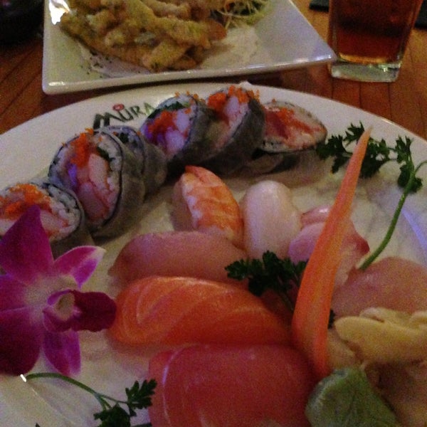 Photo taken at Mura Japanese Restaurant by Martial B. on 5/1/2013