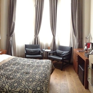 Das Foto wurde bei Stories Hotel Karakol von Svetlana S. am 1/2/2014 aufgenommen