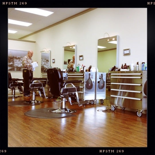 Photo taken at Piedmont Barbers by Jim M. on 12/8/2012