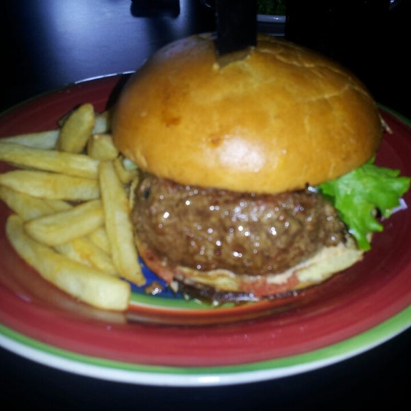 Photo taken at Hamburger Mary&#39;s by Robbin T. on 6/7/2013