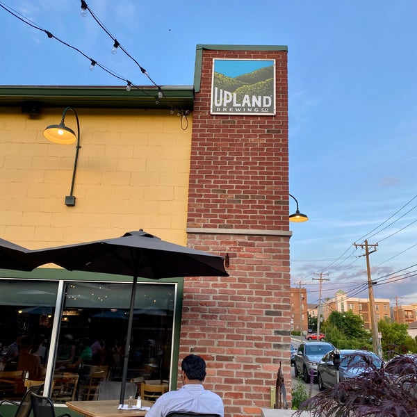 Photo taken at Upland Brewing Company Brew Pub by Jacob G. on 6/10/2022